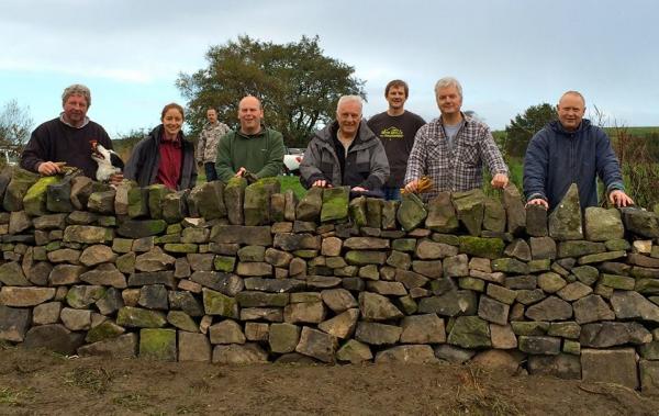 Dry stone walling group on a previous course